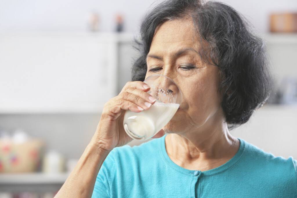 female drinking milk