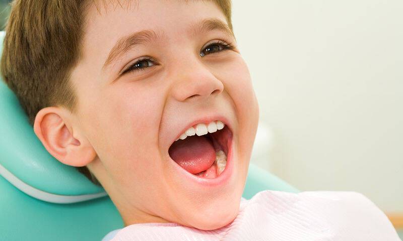 bigstock-Child-At-The-Dentistry-4955102