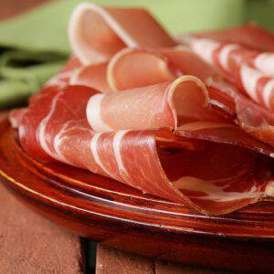 bigstock-sliced-dried-sausage-meat-ham-58731296