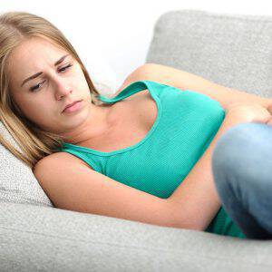 bigstock-Woman-having-abdominal-pain-u-74597338