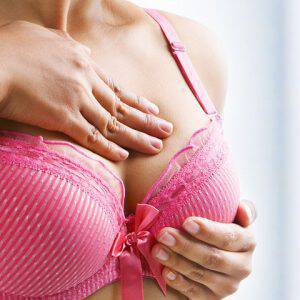 bigstock-Woman-Doing-Self-Breast-Examin-6044620