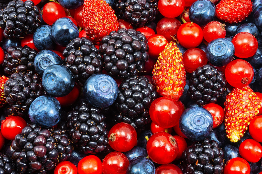 Background Of Fresh Summer Berries. Ripe Blackberries, Blueberries, Strawberry And Raspberries. Top